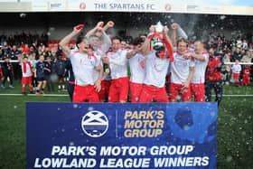 Spartans lift the Lowland League trophy and now have the pyramid play-offs to look forward to. Picture: Mark Brown / Spartans FC