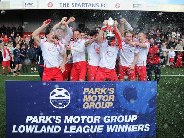 Spartans lift the Lowland League trophy and now have the pyramid play-offs to look forward to. Picture: Mark Brown / Spartans FC