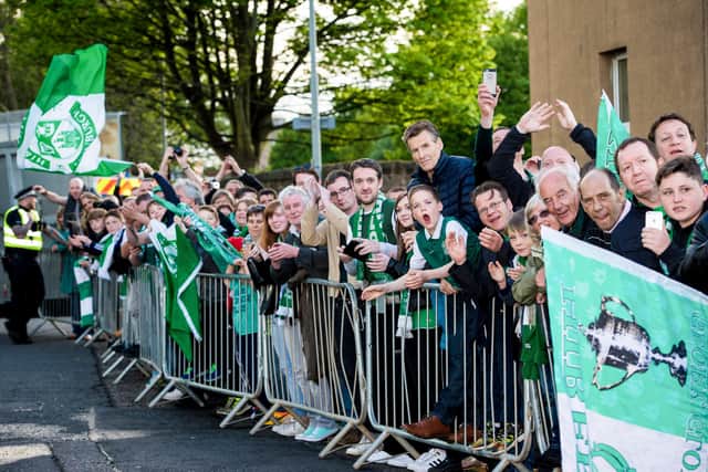 Hibs fans gather at Easter Road to welcome the team bus back from Hampden