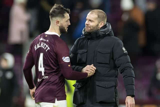 Robbie Neilson congratulates Craig Halkett after Hearts defeated Kilmarnock 3-1 on their return to action in the cinch Premiership. Picture: SNS