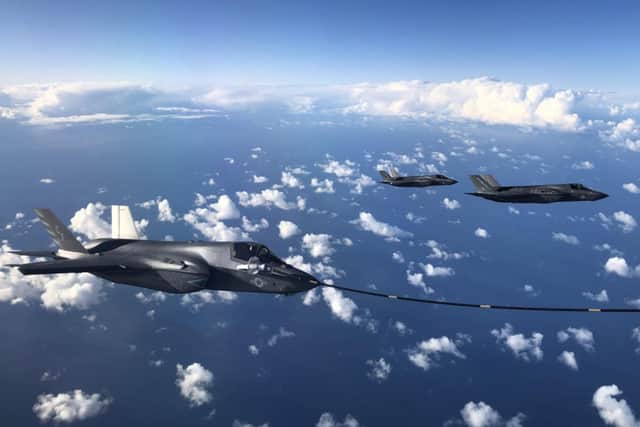 A F-35B combat aircraft from the United States Marine Corp refuels from an RAF Voyager aircraft over the North Sea on October 08, 2020 in flight, above Scotland. Pictures: Leon Neal.