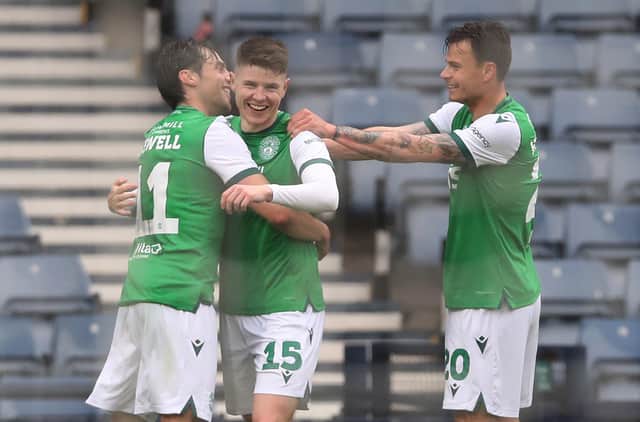 Kevin Nesbit celebrates scoring his team's opening goal during the Scottish Cup semi-final between Dundee United and Hibernian. (Photo by Ian MacNicol/Getty Images)