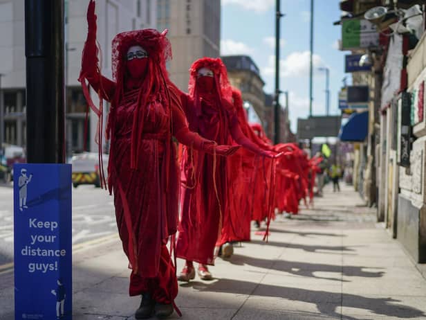 Extinction Rebellion's Red Rebels will take part in Saturday's energy price protest in Edinburgh.  Photo: Christopher Furlong/Getty Images.