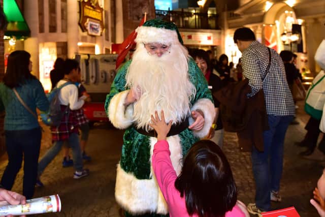 Santa Claus was green before he was read (Picture: Yoshikazu Tsuno/AFP via Getty Images)