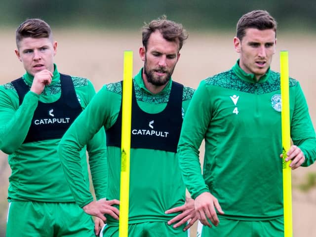 Hibs' Kevin Nisbet, Christian Doidge and Paul Hanlon during training. Photo by Mark Scates / SNS Group