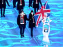 Great Britain's flag bearers Dave Ryding and Eve Muirhead lead the team out during the opening ceremony of the Beijing 2022 Winter Olympic Games at the Beijing National Stadium in China. Picture date: Friday February 4, 2022.