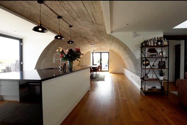 Euan did much of the work himself, converting the former concrete water tank into a distinctive family home.
