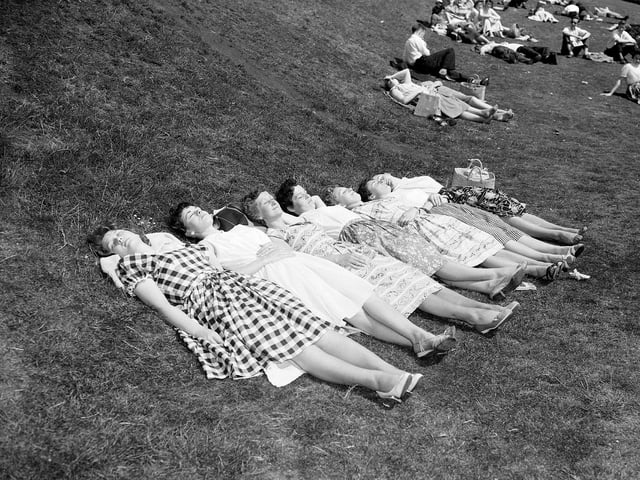 Girls sunbathing in Princes Street Gardens during a heatwave in Edinburgh in June 1960.