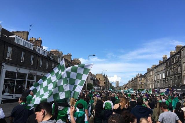 Thousands of Hibs fans follow the open-top bus down Leith Walk the following day. Photo: Submitted