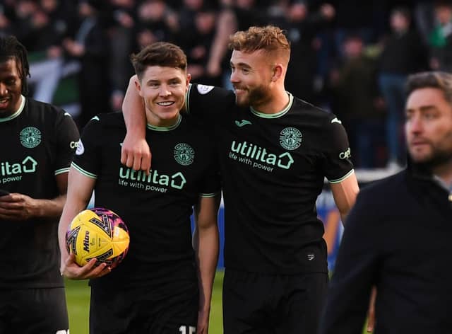 Kevin Nisbet and Ryan Porteous celebrate Hibs' win at Motherwell earlier this month