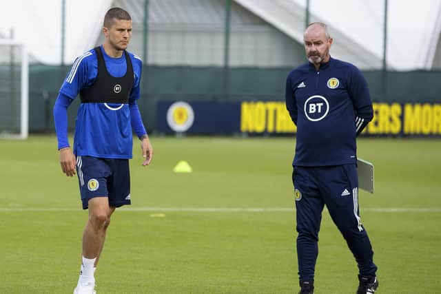 Lyndon Dykes with Scotland manager Steve Clarke during a Scotland training session (Picture: Craig Williamson/SNS Group)