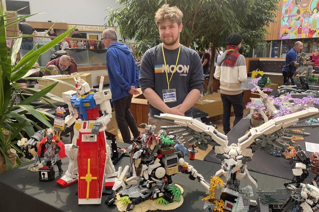 James Kavanagh with his many LEGO models based on fantastical robots and creatures.