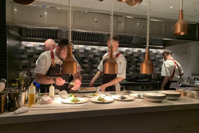 In the Commons Club restaurant the communal Chef’s Table has a view of the open kitchen. Pic: J Christie