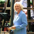 Sue Barker puts down her Robinsons barley water long enough to have her picture taken at Wimbledon. (Photo by Ryan Pierse/Getty Images)