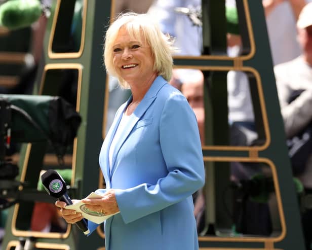 Sue Barker puts down her Robinsons barley water long enough to have her picture taken at Wimbledon. (Photo by Ryan Pierse/Getty Images)