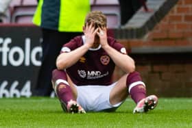 A dejected Stephen Kingsley at full-time as Hearts lose to St Mirren in the cinch Premiership. Picture: SNS