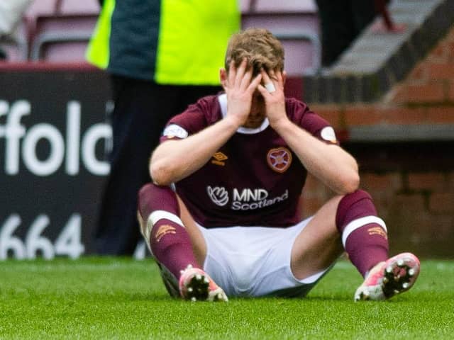 A dejected Stephen Kingsley at full-time as Hearts lose to St Mirren in the cinch Premiership. Picture: SNS