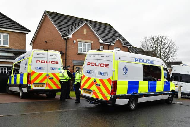 Officers at the couple's home in Glasgow yesterday as part of the police investigation into SNP finances. Picture Michael Gillen.