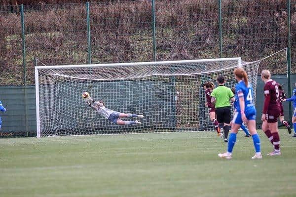 Charlotte Parker-Smith making a finger-tip save to keep the scores level.