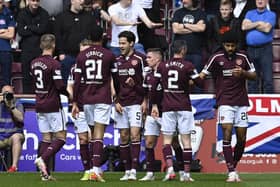 The Hearts players celebrate after Peter Haring opened the scoring at Tynecastle. Picture: SNS