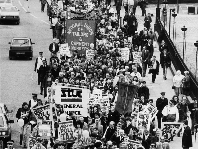 Protestors against the Poll Tax march up the Mound in April 1989.