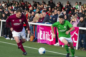 There was a good crowd inside Ainslie Park as Hibs and Hearts legends went head-to-head in a charity match on World Mental Health Day. Pics: Lisa Ferguson