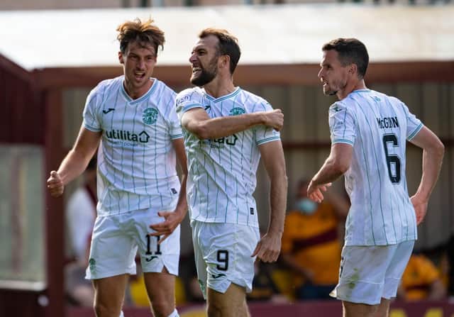 Hibs striker Christian Doidge (centre) celebrates his goal during the opening Premiership match of the season against Motherwell. Photo by Craig Foy / SNS Group