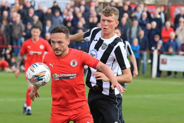 Ross Gray holds off a Fraserburgh defender. Picture: Joe Gilhooley LRPS