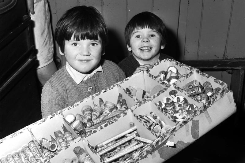 Edinburgh sisters Joan and Donna Pattie look forward to Bonfire Night 1967 with a box of Standard fireworks.