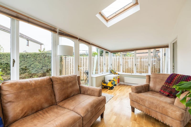 The addition of a sunroom at the South Queensferry home provides a serene family space to relax and enjoy the natural surroundings.