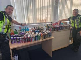 British Transport Police officers with alcohol seized from rail passengers in the west of Scotland
Pic: BTP