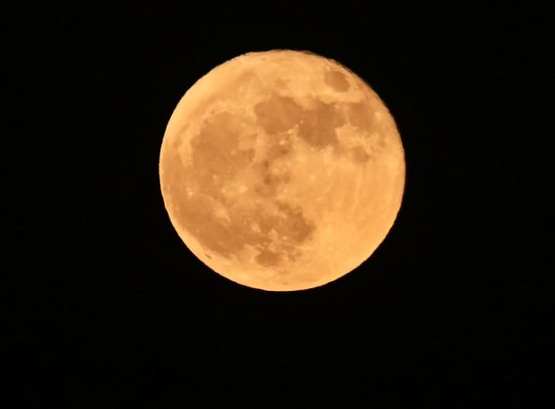 June saw a 'Strawberry' supermoon, rising here over Los Angeles. Photo: Frederic J. BROWN / AFP.