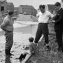 Flooding at Redhall Crescent in Longstone in September 1964 when a miniature reservoir burst its banks.