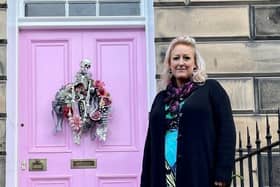 Miranda Dickson outside her her pink door in Drummond Place.  Picture: Courtesy of Miranda Dickson/SWNS