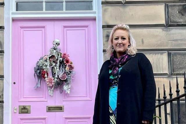 Miranda Dickson outside her her pink door in Drummond Place.  Picture: Courtesy of Miranda Dickson/SWNS