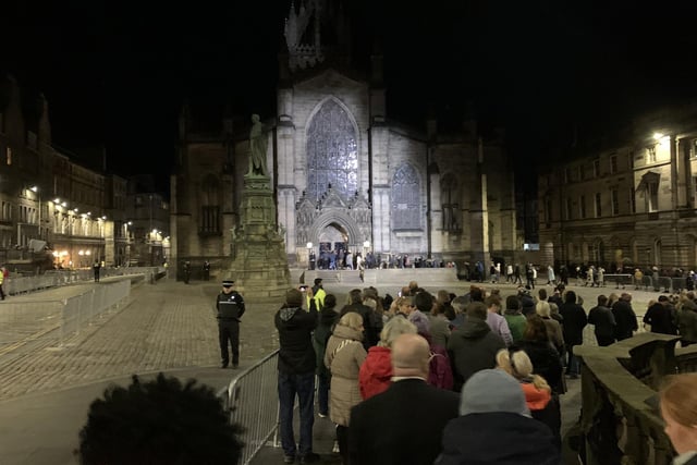 People in Edinburgh queueing to pay their respects to the Queen as she lies in state at St Giles' Cathedral. Picture date: Tuesday September 13, 2022.