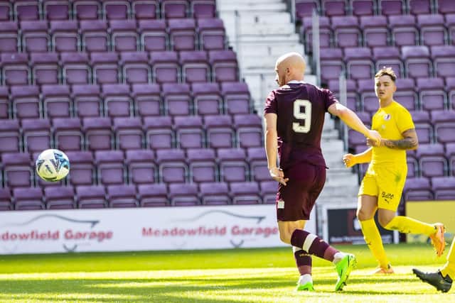 Liam Boyce scores to make it 3-0 for Hearts during the friendly against Bonnyrigg Rose at Tynecastle Park. Picture: Roddy Scott / SNS