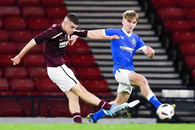 Hearts forward Murray Thomas scores against Rangers in the Youth Cup final.