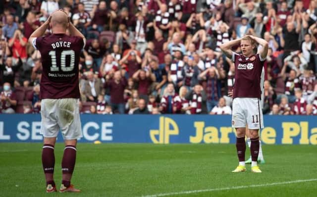 Hearts' Gary Mackay-Steven (R) after missing a second half chance during a cinch Premiership match between Hearts and Aberdeen at Tynecastle Park, on August 22, 2021, in Edinburgh, Scotland.(Photo by Mark Scates / SNS Group)