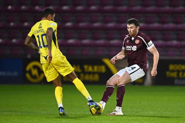 John Souttar in action against Ross County during Hearts' last cinch Premiership encounter. Picture: SNS