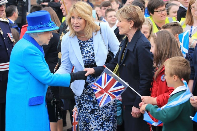 Her Majesty The Queen met locals on the platform.