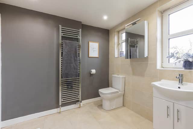 The luxury four-piece family bathroom enhanced by underfloor heating.