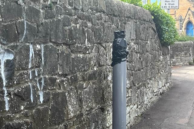 The street pillar which had the cameras was chopped in two, with the top half now taken away.
