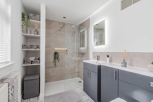 The principal bedroom benefits from this modern en-suite shower room.