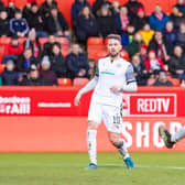 Brian Schwake is beaten by Aberdeen striker Christian Ramirez during the Scottish Cup fourth round between Aberdeen and Edinburgh City at Pittodrie