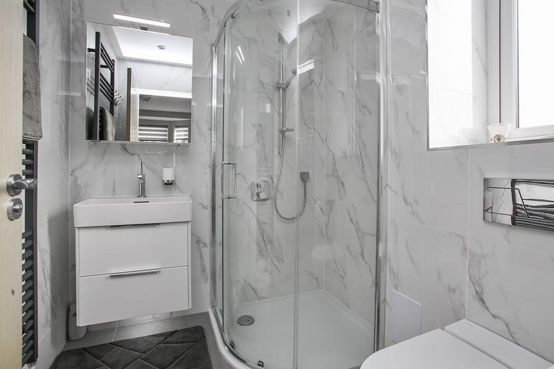 Yet another en-suite shower room inside this incredible family home.