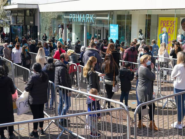 Shoppers queue outside a Primark store in Stoke-on-Trent this week