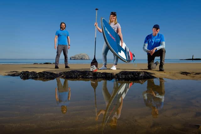 Mollie Hughes with Stevie Boyle and Adrian Boot of Ocean Vertical at Seacliff Beach, East Lothian.
PIC: Mike Wilkinson
