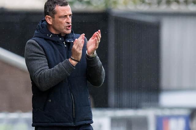 Jack Ross applauds a good passage of play from his team during Hibs' 3-0 win at St Mirren