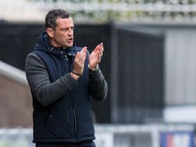 Jack Ross applauds a good passage of play from his team during Hibs' 3-0 win at St Mirren
